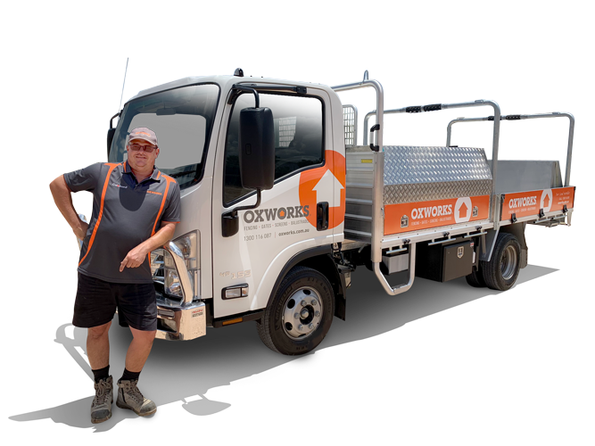 Fred Huntley, Certified Oxworks Installer, standing infront of hist truck.