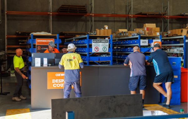 Oxworks staff assisting customers in the despatch area